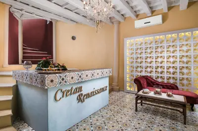 a lobby with a coca cola sign on the wall at Cretan Renaissance in Chania Town
