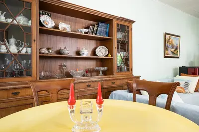 a dining room with a table with two wine glasses at Irini House in Arménoi