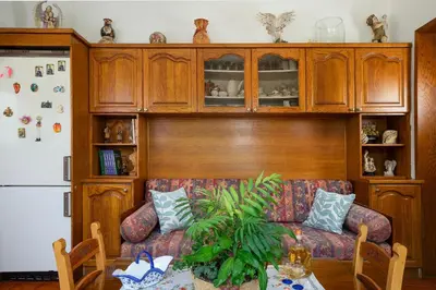 a living room with a couch and a table at Irini House in Arménoi