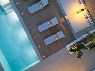 an overhead view of a room with glass walls at Villa Staride, sea view, private heated pool, playground in Païdhokhórion