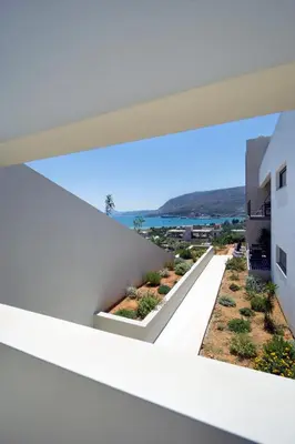 a view from the balcony of a white building at Seametry Luxury Living Apartments ADULTS ONLY in Souda