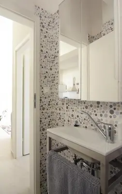 a bathroom with a sink and a mirror at Christini Apartment in Chania Town