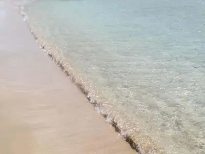 a close up of the water on the beach at Ktima Grammeno Beachside Villa in Palaiochóra