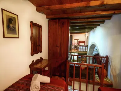 a room with a stairway with a wooden ceiling at Villa in Crete with Vineyard Experience in Kalamítsion Alexándrou