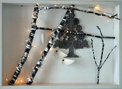 a christmas tree made out of branches with lights at Hera Studios in Chania Town