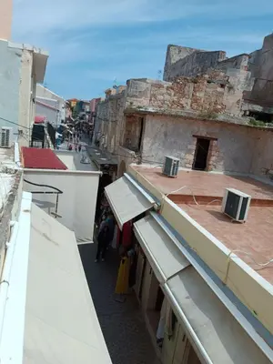 a view from a balcony of an old building at Imeros in Chania Town