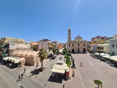 an overhead view of a city street with a clock tower at Nikolas Rooms in Chania Town
