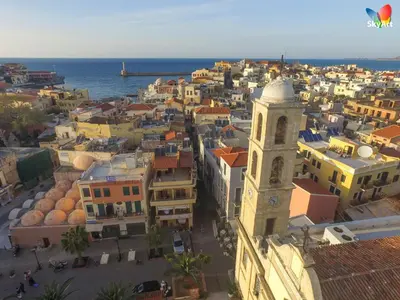 an aerial view of a city with a clock tower at Nikolas Rooms in Chania Town
