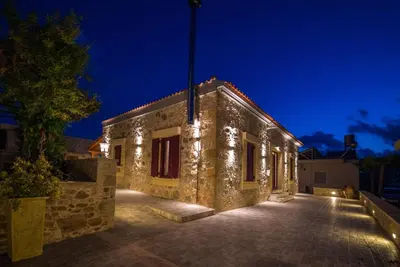 a building with lights on it at night at PRIVATE Sapphiros Villa in Kissamos