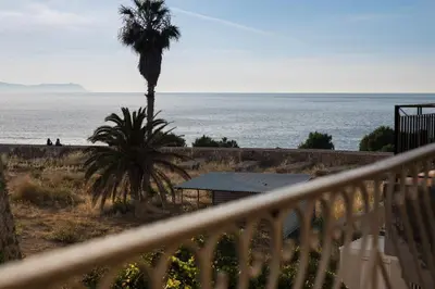 a view of the ocean from a balcony at Aeria Apartments in Chania Town