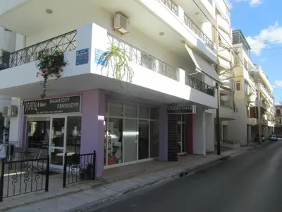 a building on the side of a street at Economy Studio Apartments in Chania Town