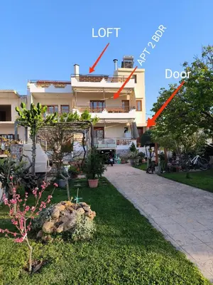 a picture of a building with the words idiot and a garden at Contemporary 2 bedroom apt 5 min walk from Kissamos center in Kissamos