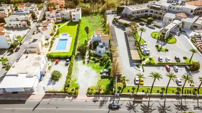 an aerial view of a city with houses and cars at Gelina Apartments in Plataniás