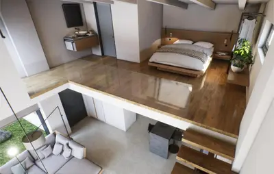 an overhead view of a bedroom with a bed and a desk at Iskios Villas in Agia Marina Nea Kydonias