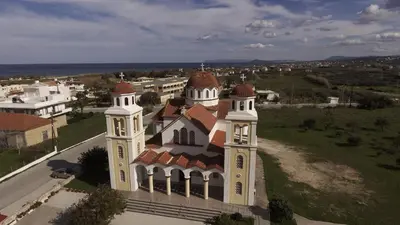 an aerial view of a building with a tower at Villa Meli-milon in Kolymvari