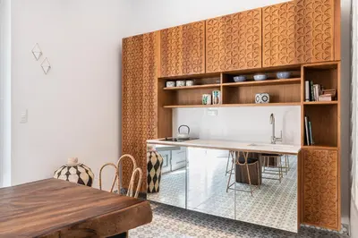 a kitchen with a counter and a table in a room at Nyx Chic Manor in Chania Town