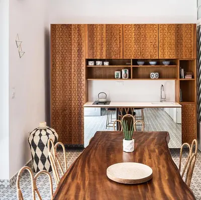 a dining room with a wooden table and chairs at Nyx Chic Manor in Chania Town