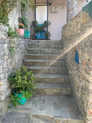 a set of stairs leading up to a house at Irini Apartment II in Kalyves