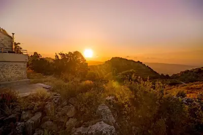 a sunset from the top of a mountain at Lithari in Kámboi