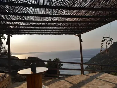 a view of the ocean from a pergola at Fudulis Villa in Ravdhoúkha