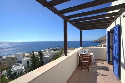 a balcony with a view of the ocean at Sfakian Horizon in Khóra Sfakíon