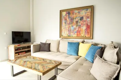 a living room with a couch and a coffee table at Villa Levande in Sfinárion