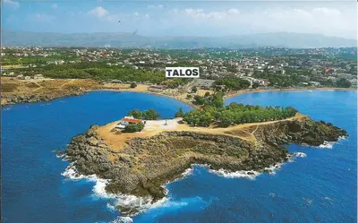 an island in the ocean with the word tacos on it at Talos Hotel Apartments in Kato Daratso