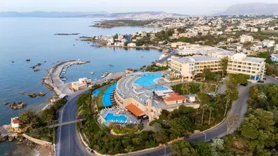 an aerial view of a resort on the water at Leptos Panorama Hotel in Kalamaki Chanion