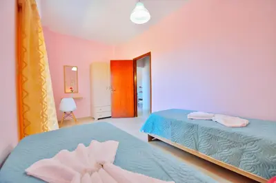 a bedroom with two beds in a room at Eliana in Kissamos