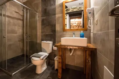 a bathroom with a toilet and a sink and a shower at Fairytale Elafonisi in Elafonisi