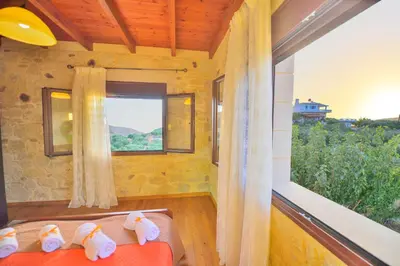 a room with a bed and a window at Villa Athina in Kissamos