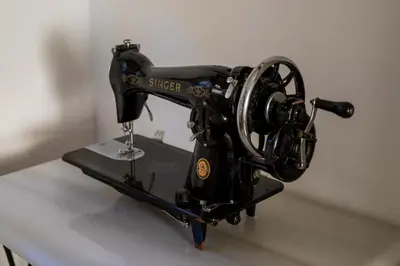 a black sewing machine sitting on top of a table at The Olive House in Kondomari