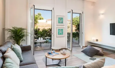 a living room with a couch and a table at No17 Pireos Street in Chania Town
