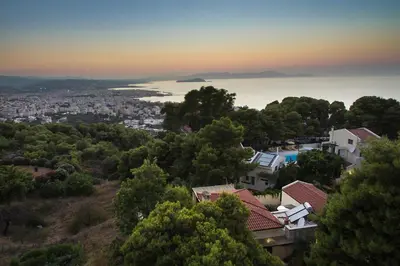 an aerial view of a city and the ocean at Koukounari luxury villa in Chania Town