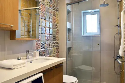 a bathroom with a sink and a shower at Villa Despina in Kisamos in Kissamos