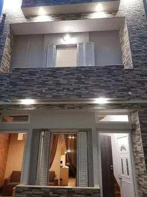 a view of a house with a living room at Agora Apartment First Floor in Kissamos