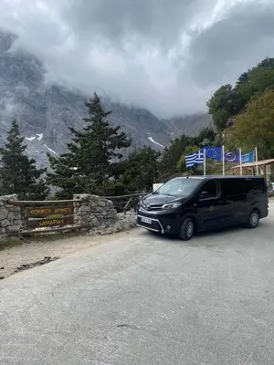 a black van parked on the side of a road at Libyan Princess in Palaiochóra