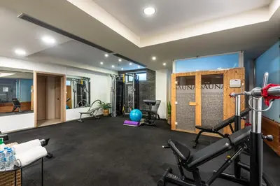 an exercise room with a gym with exercise equipment at Libyan Princess in Palaiochóra