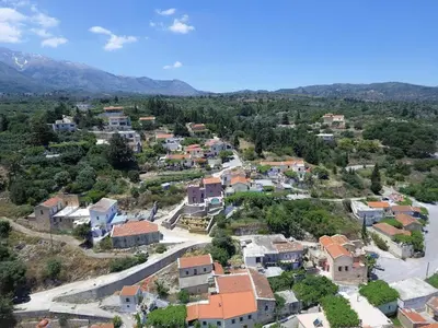 an aerial view of a small town with houses at Listen to Nature in a Renovated Traditional Hilltop Villa Liodosifis with Heated Pool in Païdhokhórion