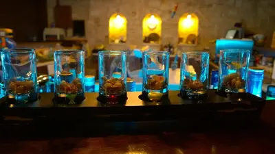 a group of glass vases with fish in them at Kallicrates Village in Frangokastello