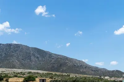 a view of a mountain with a blue sky at Rooms Kochilas Elafonisi in Elafonisi