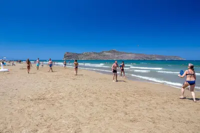 a group of people playing on the beach at SUPERIOR VILLA MARINA MARE Sauna - Hammam - Pool - 250m from Beach in Agia Marina Nea Kydonias