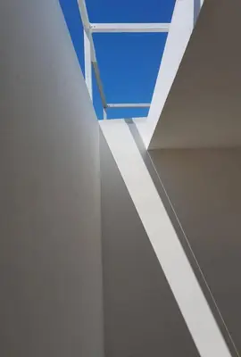 a staircase in a white building with a blue sky at Villa L2/ Boutique Villa in Kato Daratso