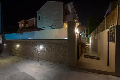 a villa with a swimming pool at night at Villa Christy in Stalos