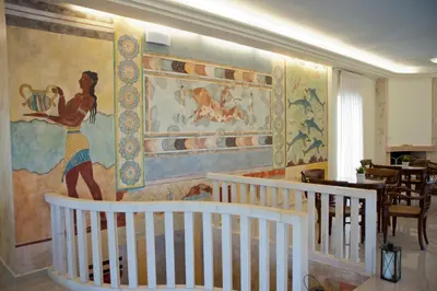 a room with a painting on the wall at Hotel Caretta Beach in Gerani Chanion
