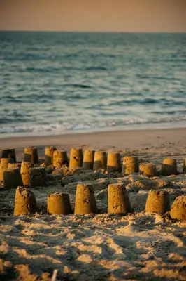 a sand castle on a beach near the ocean at Hotel Caretta Beach in Gerani Chanion