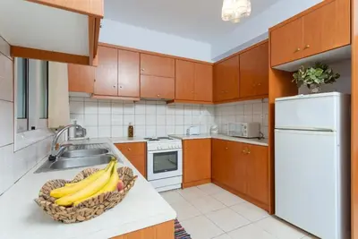 a kitchen with a bowl of bananas on the counter at Villa Giannis in Áyios Andónios