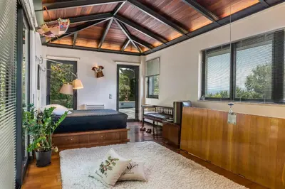 a bedroom with a bed and a window at Artistic Pool Private Villa in Chania Town