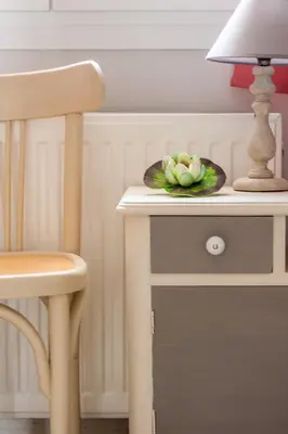 a bowl of fruit on a table with a lamp at Skandalakis Homes & Apartments in Stalos