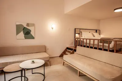 a living room with a couch and a bunk bed at Casa Veneta in Chania Town
